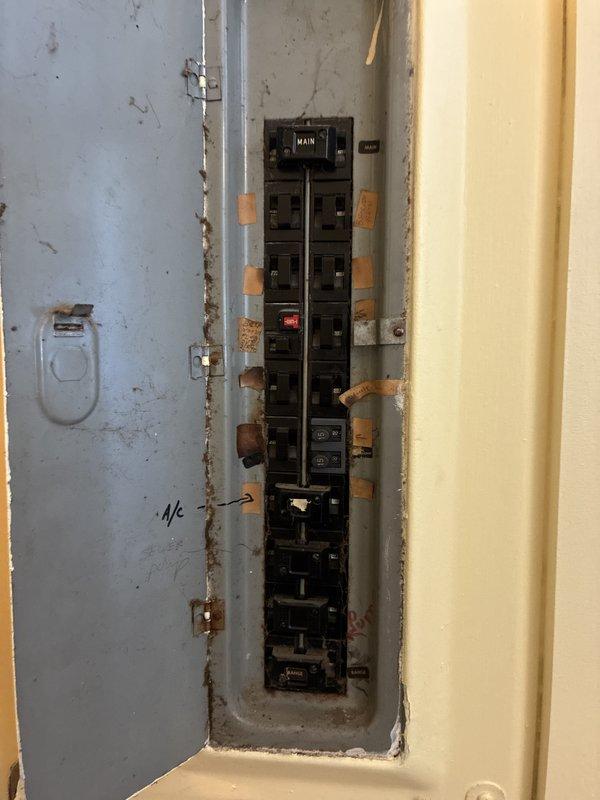 Provided estimate for replacement of 21-year-old furnace and air conditioning system located in crawl space, with natural gas fuel source. Evaluated existing electrical panel showing significant rust and corrosion, recommending potential panel upgrade to support new HVAC equipment installation. Documented current system conditions and electrical infrastructure to prepare comprehensive replacement proposal.