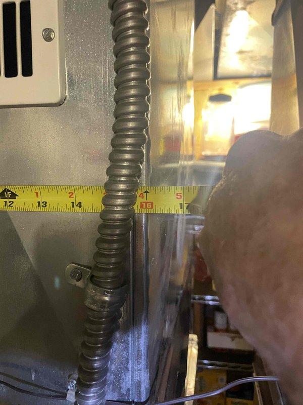 Provided comprehensive estimate for air conditioning system replacement in basement location. Current 7-year-old unit is non-operational and requires full replacement. Documented existing equipment configuration, ductwork conditions showing significant dust and lint accumulation, and measured clearances for new equipment installation.