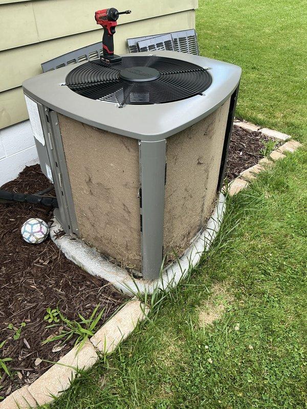Responded to service call for excessive noise from 3-year-old residential air conditioning unit while still maintaining cooling capacity. Performed diagnostic inspection of outdoor condenser unit located in basement-level installation against exterior wall. Identified and addressed noise issue through mechanical adjustment and component inspection. Verified proper operation of condenser fan assembly and compressor. Unit tested and confirmed to be operating within normal parameters with reduced noise levels upon completion.