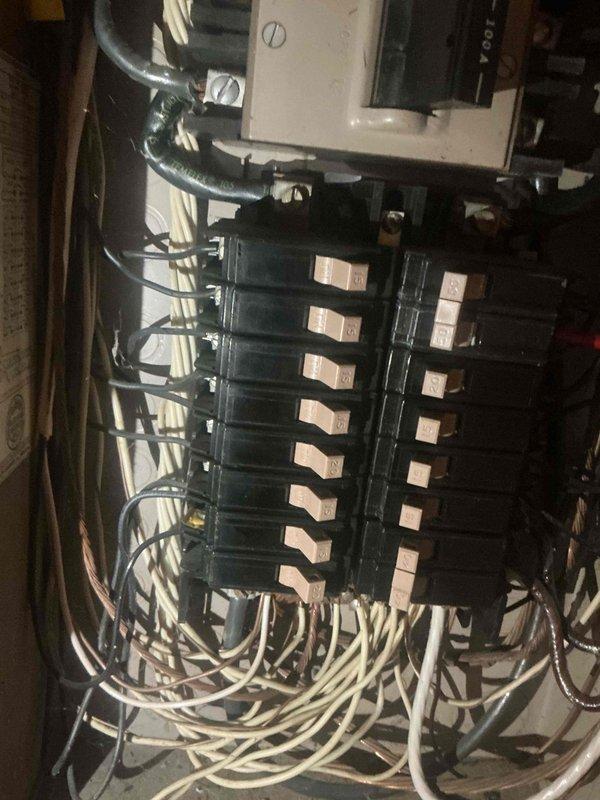 Completed comprehensive whole home electrical inspection of residential electrical system. Performed thorough evaluation of main electrical panel, verifying proper circuit breaker installation, labeling, and wire terminations. Inspected service entrance wiring, panel grounding, and overall system organization. Documented existing panel configuration showing multiple branch circuits with adequate breaker protection. Noted dense wire bundle at panel base and evaluated wire management and connections for code compliance. Assessed electrical meter installation and surrounding infrastructure. Provided photographic documentation of panel interior and exterior conditions for homeowner records.