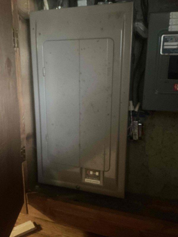 Completed comprehensive whole home electrical inspection of residential electrical system. Performed thorough evaluation of main electrical panel, verifying proper circuit breaker installation, labeling, and wire terminations. Inspected service entrance wiring, panel grounding, and overall system organization. Documented existing panel configuration showing multiple branch circuits with adequate breaker protection. Noted dense wire bundle at panel base and evaluated wire management and connections for code compliance. Assessed electrical meter installation and surrounding infrastructure. Provided photographic documentation of panel interior and exterior conditions for homeowner records.