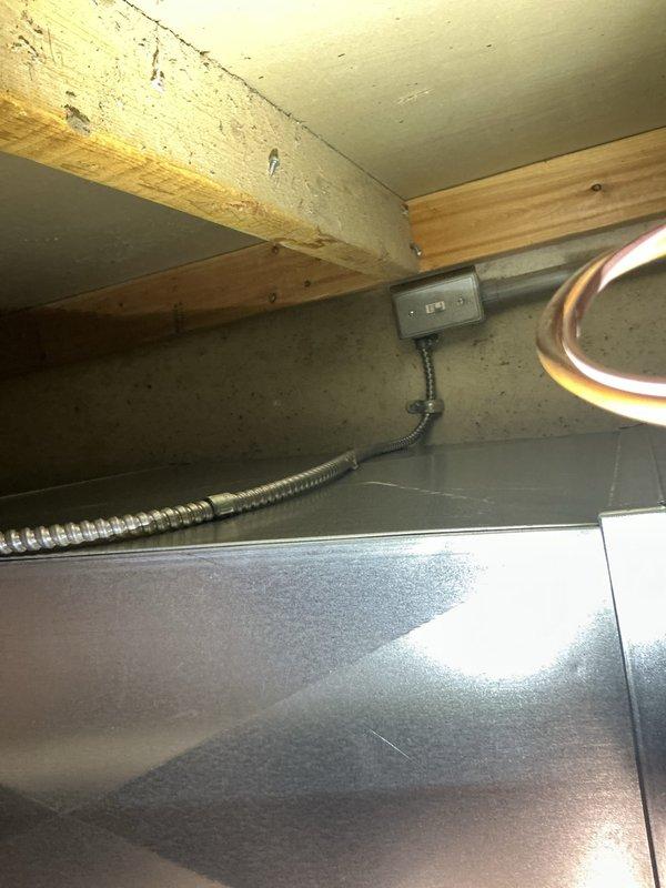 Responded to recall on recently installed 70,000 BTU furnace and 2.5 ton A/C system where unit would not respond to thermostat commands and could not be shut off without tripping breaker. Diagnosed and corrected thermostat communication issue, verified proper system operation and cycling. Relocated furnace disconnect switch from inaccessible location to front of drop ceiling for improved accessibility per customer request. Tested all system functions including heating, cooling, and safety controls to ensure proper operation and thermostat response.