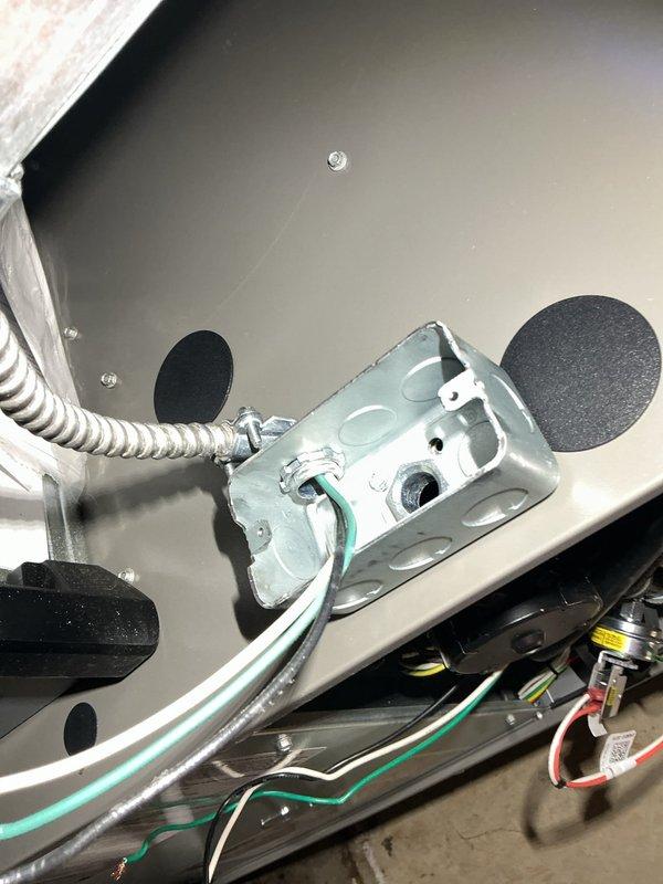 Responded to recall on recently installed 70,000 BTU furnace and 2.5 ton A/C system where unit would not respond to thermostat commands and could not be shut off without tripping breaker. Diagnosed and corrected thermostat communication issue, verified proper system operation and cycling. Relocated furnace disconnect switch from inaccessible location to front of drop ceiling for improved accessibility per customer request. Tested all system functions including heating, cooling, and safety controls to ensure proper operation and thermostat response.
