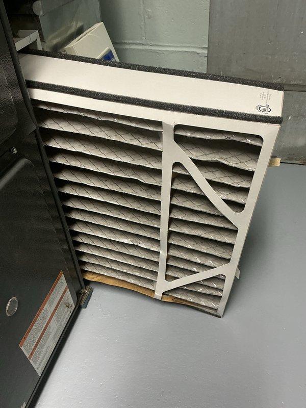 Completed annual preventative maintenance on Lennox condensing unit. Inspected outdoor unit for proper operation, checked refrigerant levels, and verified electrical connections at disconnect box. Cleaned condenser coils and removed debris from around unit including mulch and vegetation growth near base. Evaluated and replaced air filters in indoor air handler, removing heavily soiled filters and installing new pleated media filters with foam gasket seals to ensure proper system airflow and filtration efficiency. Confirmed all system components operating within normal parameters upon completion of maintenance service.