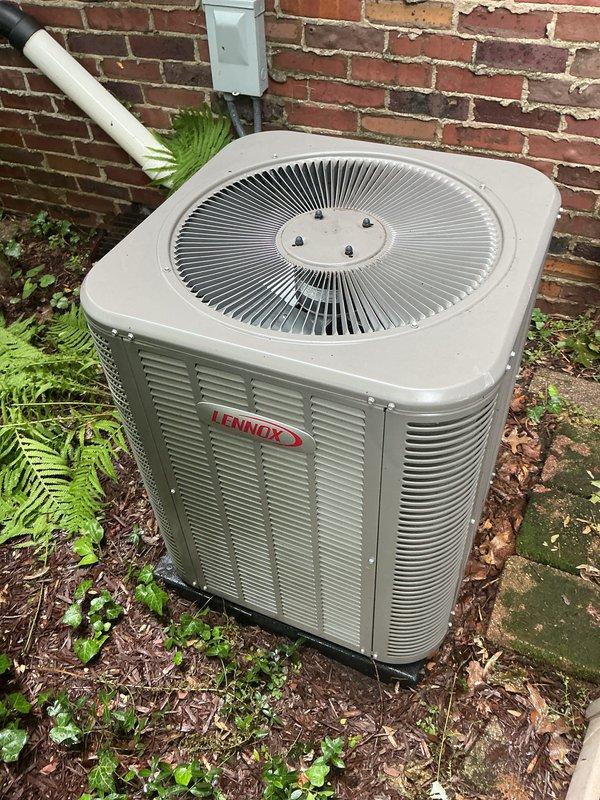 Completed annual preventative maintenance on Lennox condensing unit. Inspected outdoor unit for proper operation, checked refrigerant levels, and verified electrical connections at disconnect box. Cleaned condenser coils and removed debris from around unit including mulch and vegetation growth near base. Evaluated and replaced air filters in indoor air handler, removing heavily soiled filters and installing new pleated media filters with foam gasket seals to ensure proper system airflow and filtration efficiency. Confirmed all system components operating within normal parameters upon completion of maintenance service.