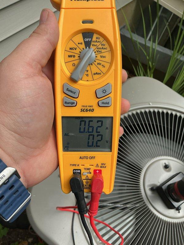 Completed routine air conditioning maintenance on residential split system. Performed electrical diagnostics using multimeter to verify proper amperage draw and voltage readings at condenser unit. All measurements within manufacturer specifications, system operating normally with no issues identified.
