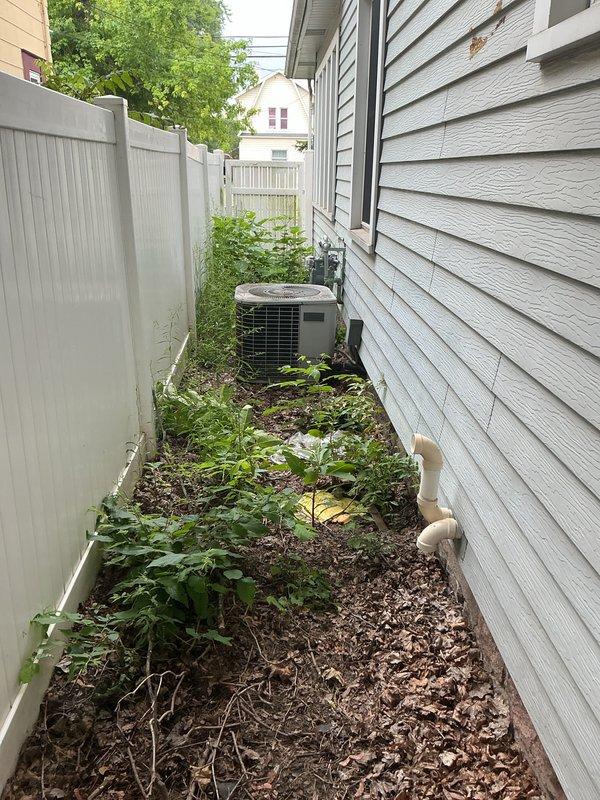 Completed annual HVAC maintenance on residential air conditioning system. Inspected outdoor condenser unit, replaced air filter and evaporator pad, and cleared debris and vegetation from around equipment to ensure proper airflow and system efficiency.