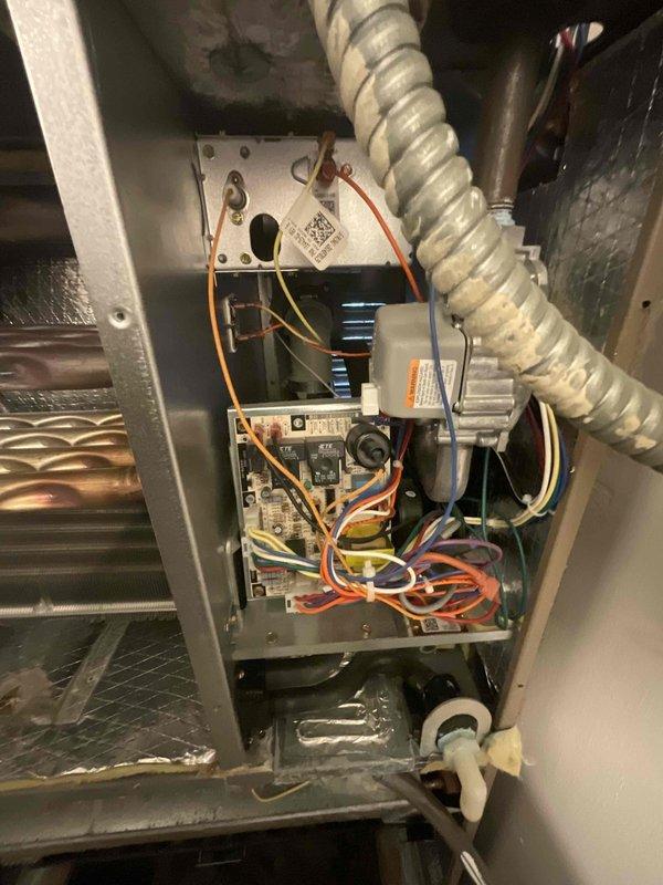 Performed comprehensive assessment of non-operational basement air conditioning system with unknown age. Upon inspection, identified heavily soiled evaporator coil with significant dust and debris accumulation, compromised air filtration system, and drainage pan exhibiting extensive discoloration and staining indicative of prolonged moisture exposure. Documented deteriorated internal components including control board, wiring connections, and heat exchange surfaces showing substantial wear. Provided detailed replacement estimate for complete HVAC system due to overall condition and operational failure of existing equipment.