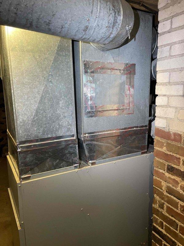 Conducted on-site evaluation for heat pump replacement on a 20-year-old existing system. Assessed electrical panel capacity and circuit availability to determine compatibility for new Mitsubishi Hyperheat unit installation. Inspected current furnace/air handler configuration and existing ductwork infrastructure in basement mechanical room. Documented electrical service specifications, reviewed circuit breaker panel layout including available amperage for new equipment requirements, and evaluated structural considerations for equipment placement. Provided comprehensive assessment and prepared replacement estimate for complete heat pump system installation.