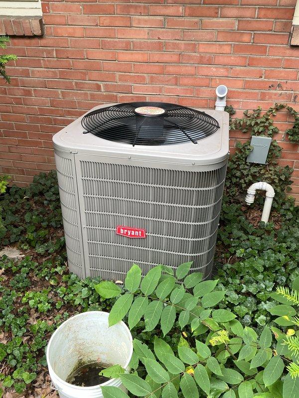 Completed annual air conditioning maintenance on Bryant condensing unit and air handling system per maintenance plan agreement. Performed comprehensive tune-up including inspection of outdoor condenser unit, verified proper operation of compressor and condenser fan motor, checked refrigerant levels and system pressures, inspected electrical connections and contactors, cleaned condenser coils, and examined condensate drainage lines. Inspected indoor air handler components, evaluated air filter condition and replaced filter media, verified blower motor operation and airflow, checked ductwork connections for proper sealing, and tested thermostat functionality. All system components operating within manufacturer specifications with no deficiencies noted. System cooling properly and ready for continued service.