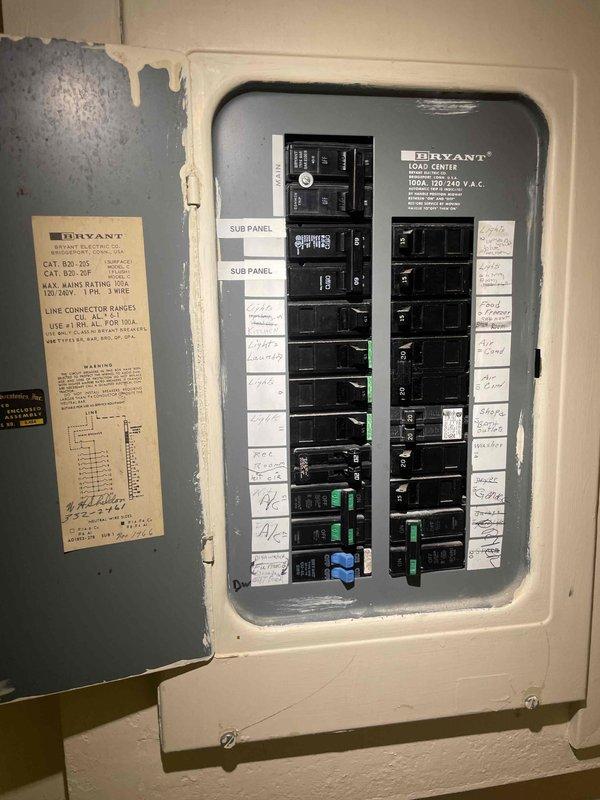 Conducted on-site evaluation for mini split heat pump installation. Assessed existing electrical infrastructure, including 100A Bryant load center with available circuit capacity and sub-panel connections. Inspected current HVAC system consisting of Bryant furnace unit in basement mechanical room. Documented electrical panel configuration, available breaker positions, and wiring pathways to determine optimal installation routing for new mini split system. Photographed equipment locations and utility room layout to develop installation plan and equipment placement recommendations for heat pump outdoor condenser and indoor air handling units.