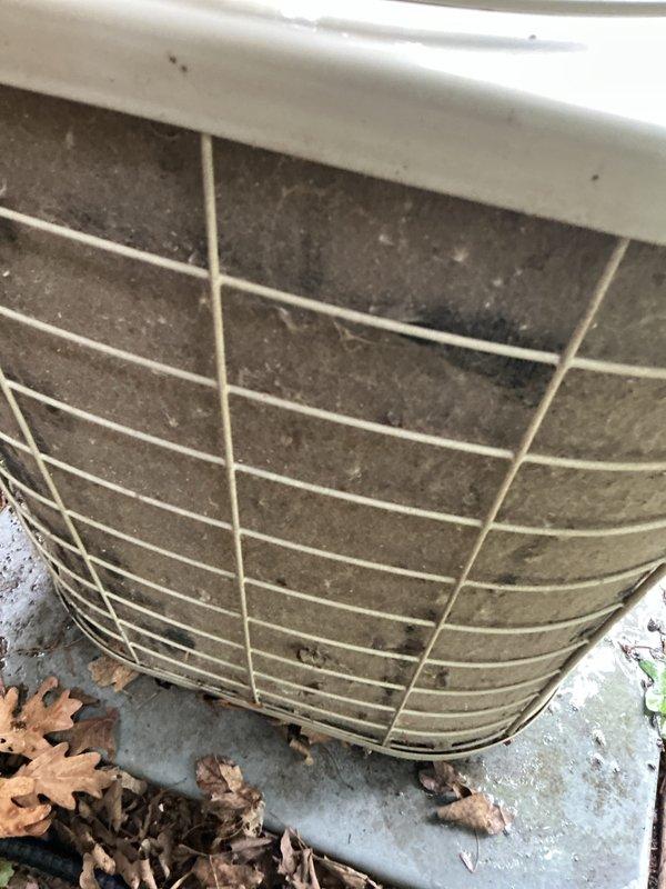 Performed routine maintenance on residential air conditioning system. Determined and replaced air filter per customer request, as original size was unknown. Inspected outdoor condenser unit, which showed significant accumulation of dirt, debris, and environmental buildup on protective grille and housing. Completed standard tune-up procedures including system performance evaluation and operational checks to ensure proper cooling function.