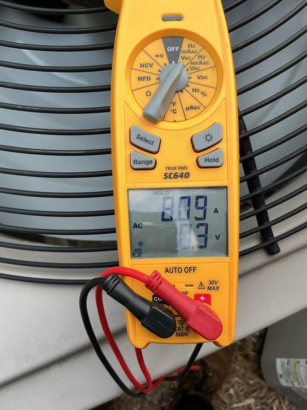 Performed annual cooling maintenance on residential air conditioning system. Using digital multimeter, measured and recorded condenser fan motor amperage and voltage readings to verify proper operation within manufacturer specifications. All electrical components tested and found operating normally. Unit running efficiently with no issues identified during inspection.