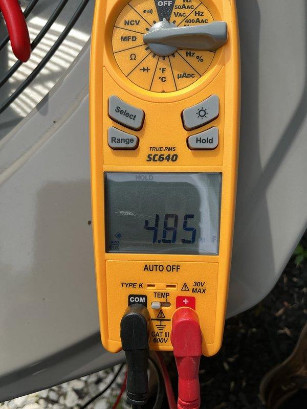 Completed annual cooling maintenance (ACM) on HVAC system during rescheduled evening appointment. Performed comprehensive inspection of equipment, verified system operation with digital multimeter readings showing normal voltage levels at 48.5V, and documented installation conditions with photographic records. All components functioning within normal parameters; no immediate service needs identified at this time.