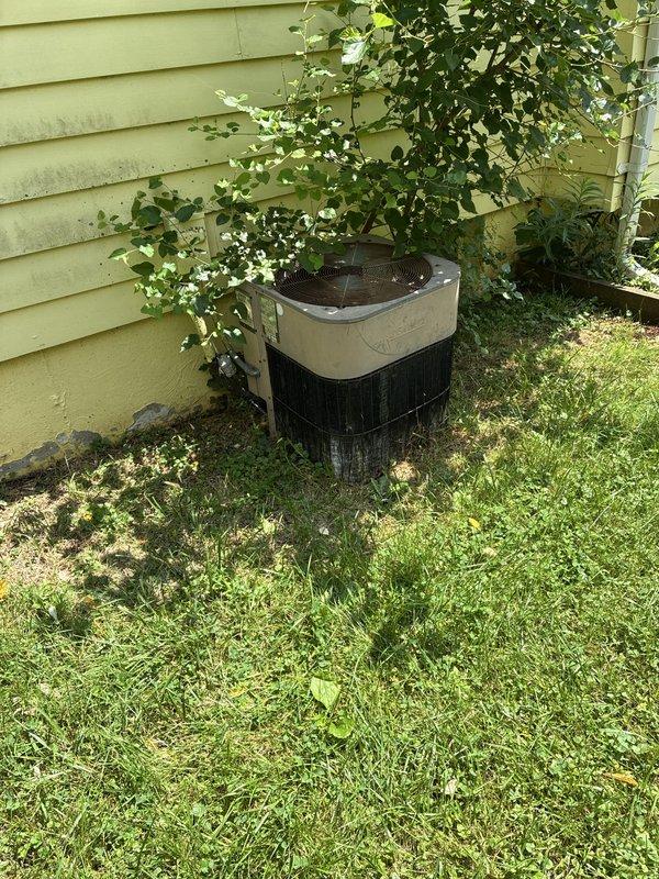 Conducted full system estimate for replacement of 16-year-old air conditioning unit that sustained damage approximately two years ago and is no longer operational. Inspected existing exterior condenser unit showing significant weathering, deterioration of electrical disconnect box and conduit, paint contamination on equipment surfaces, and vegetation overgrowth indicating extended period of disuse. Assessed current system configuration, electrical connections, and site conditions to provide comprehensive replacement recommendations for immediate installation.