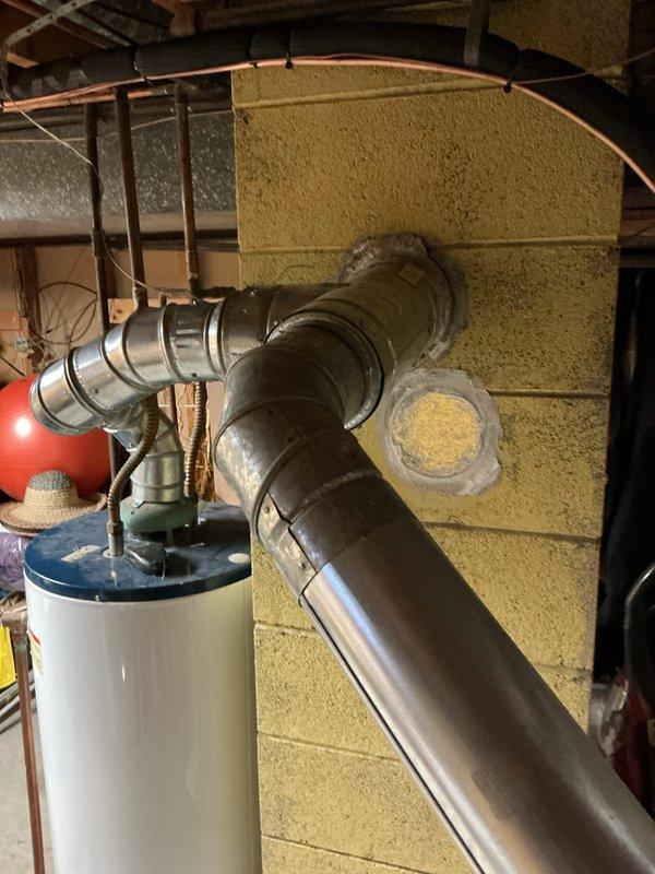 Completed installation of a 2-ton Lennox air conditioning system with matching evaporator coil at rear of residence. Obtained mechanical and electrical permits, installed outdoor condensing unit on pad with proper refrigerant line set and electrical disconnect, connected indoor evaporator coil to existing ductwork in basement utility area, and performed system startup and testing. All work completed per code requirements with system operational and ready for service.