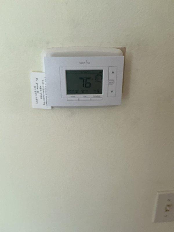 Responded to service call for thermostat displaying erratic temperature readings that were fluctuating to impossible values. Accessed unoccupied property through garage as arranged and performed diagnostic evaluation of the Sensi brand digital thermostat and connected HVAC system. Inspected thermostat unit mounted on interior wall, examined wiring connections, and assessed communication between thermostat and furnace/air handler system in basement mechanical room. Documented equipment conditions and provided diagnostic findings to customer for approval of recommended repairs.
