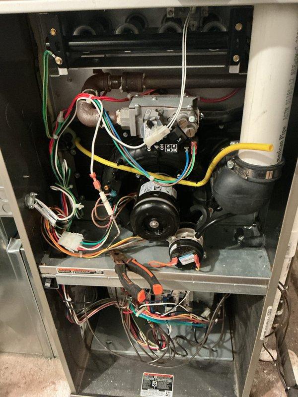 Completed annual HVAC maintenance service on residential furnace system. Performed comprehensive inspection of internal components including heat exchanger, gas valve assembly, blower motor, and electrical connections. Replaced air filter with new pleated media filter and evaporative cooler pad as required for system efficiency and optimal air quality.