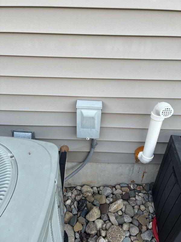 Completed on-site estimate consultation for full HVAC system replacement including both furnace and air conditioning equipment. Existing system approximately 20 years old with no reported failures or operational issues. Evaluated current outdoor AC condenser unit, electrical disconnect, condensate drainage system, and associated infrastructure mounted on exterior siding. Documented equipment specifications, installation configuration, and site conditions through photographic assessment. Reviewed available promotional offers and provided comprehensive replacement options for whole-home heating and cooling system upgrade.