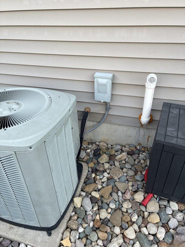 Completed on-site estimate consultation for full HVAC system replacement including both furnace and air conditioning equipment. Existing system approximately 20 years old with no reported failures or operational issues. Evaluated current outdoor AC condenser unit, electrical disconnect, condensate drainage system, and associated infrastructure mounted on exterior siding. Documented equipment specifications, installation configuration, and site conditions through photographic assessment. Reviewed available promotional offers and provided comprehensive replacement options for whole-home heating and cooling system upgrade.