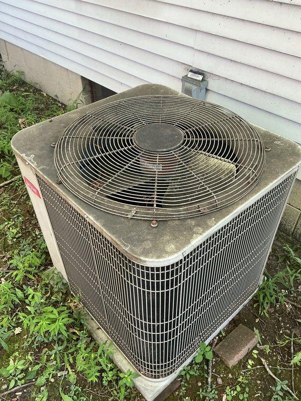 Completed annual cooling maintenance on residential HVAC system including Bryant Plus 90 furnace with integrated Space-Gard dehumidifier and outdoor condenser unit. Performed comprehensive inspection of all components, verified proper operation of furnace blower assembly, checked refrigerant lines and connections, inspected ductwork and air distribution system, and assessed outdoor condenser unit which showed signs of weathering and vegetation encroachment requiring attention. All equipment found operational with recommendations provided for condenser pad clearing and exterior unit cleaning to maintain optimal efficiency.