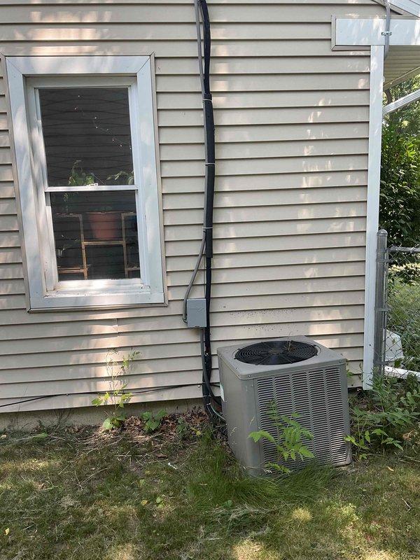 Completed on-site evaluation for full HVAC system replacement, including 21-year-old air conditioning condenser unit located on exterior and 25-year-old furnace in basement. Documented existing equipment configuration with exterior condenser showing standard electrical disconnect and typical residential installation, and basement furnace alongside Richmond water heater in mechanical room. Provided comprehensive replacement quote for complete heating and cooling system upgrade with recommended equipment options and installation timeline to accommodate customer's one-month replacement window.