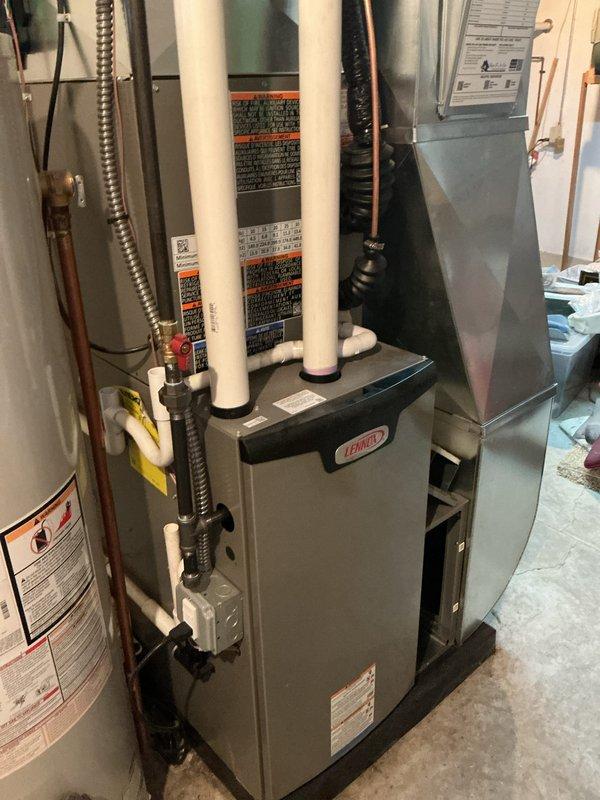Completed scheduled Air Care Heating maintenance on Bryant furnace system. Replaced furnace filter and humidifier pad as requested, documented equipment condition with photos showing system operating properly with all components in good working order.