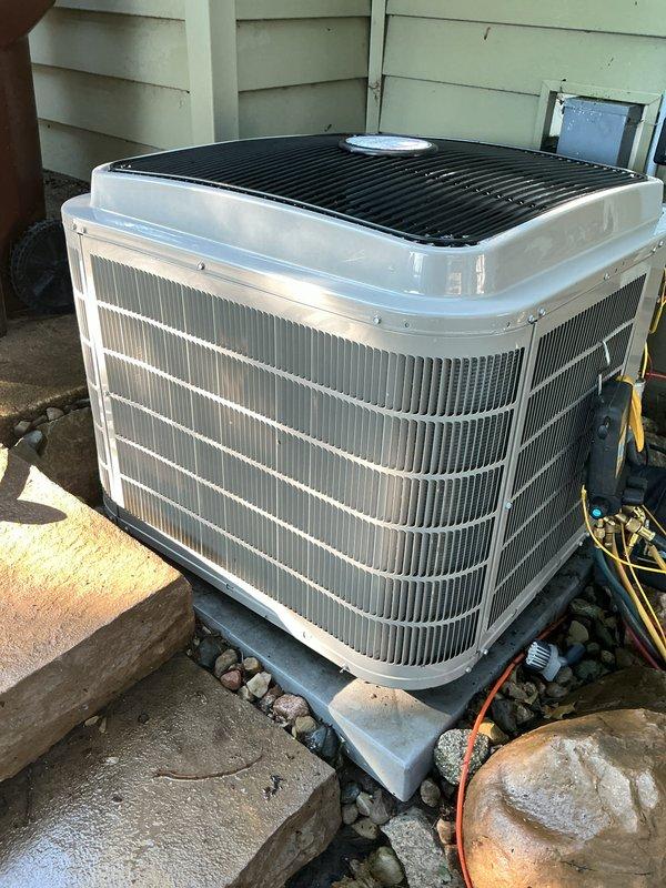 Performed routine maintenance and cleaning on a 12-year-old residential air conditioning system. Inspected outdoor condenser unit, which was found in good operating condition with clean coil fins and properly functioning fan assembly. Verified system cooling performance, checked electrical connections and disconnect, and confirmed unit operation within normal parameters. No repairs or corrective actions required at this time.
