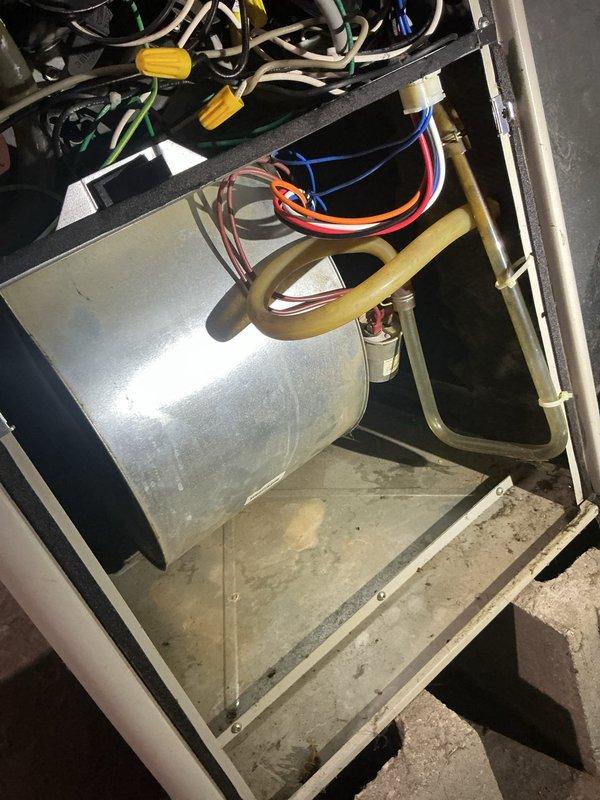 Returned to complete system repair by replacing the defective circuit board and wire harness on the HVAC unit. Additionally replaced the blower motor to restore proper system operation. All electrical connections were secured, components were tested for proper function, and the system was returned to normal operating condition.