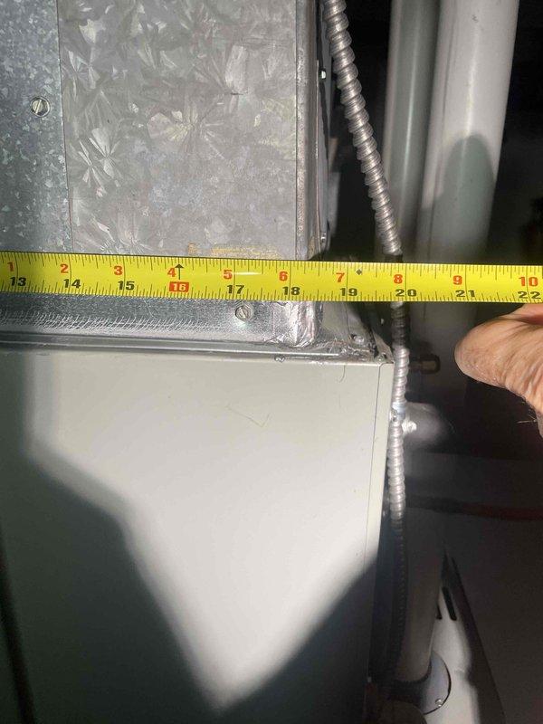 Completed comprehensive assessment of existing residential air conditioning system for full replacement estimate. System approximately 16 years old with outdoor condenser unit requiring replacement. Documented critical measurements of existing equipment dimensions and clearances to ensure proper sizing and compatibility for new system installation. Measured ductwork connections, equipment spacing, and access points necessary for replacement planning.