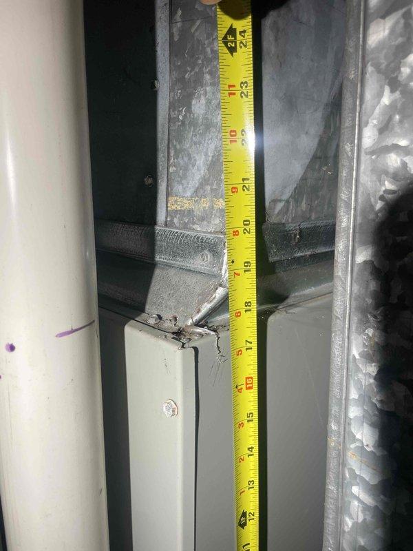 Completed comprehensive assessment of existing residential air conditioning system for full replacement estimate. System approximately 16 years old with outdoor condenser unit requiring replacement. Documented critical measurements of existing equipment dimensions and clearances to ensure proper sizing and compatibility for new system installation. Measured ductwork connections, equipment spacing, and access points necessary for replacement planning.
