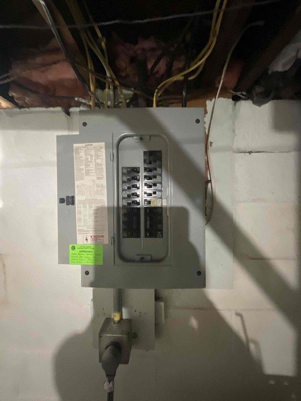 Conducted site evaluation for new central air conditioning system installation at property with no existing central air infrastructure. Assessed electrical panel capacity and circuit breaker configuration to determine adequacy for AC system power requirements. Evaluated existing furnace installation and ductwork compatibility for integration with proposed cooling system. Documented current HVAC equipment condition and utility room layout, including available space for condenser placement and refrigerant line routing. Photographed electrical service panel and mechanical room to support equipment sizing and installation planning. Provided comprehensive estimate for complete central air conditioning system installation with projected timeline for installation in early 2026.