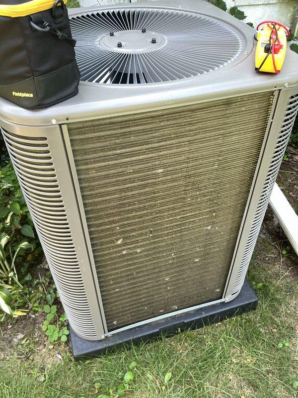 Completed annual preventive maintenance on residential air conditioning system. Performed comprehensive inspection of outdoor condenser unit, including visual assessment of cabinet condition, louvers, and mounting pad. Tested electrical components with multimeter, inspected capacitor connections and wiring integrity. Unit found to be operating within normal parameters with no immediate service needs identified. All components functioning properly at time of service.