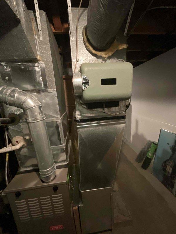 Conducted site evaluation for air conditioning system replacement estimate at residential property with basement-located HVAC equipment. Current AC unit is non-operational due to concerns about mold and mildew contamination following recent moisture remediation work, including newly installed basement pump system. Assessed existing furnace installation, ductwork configuration, and mechanical room conditions to determine appropriate replacement equipment specifications and integration requirements with current heating system infrastructure.
