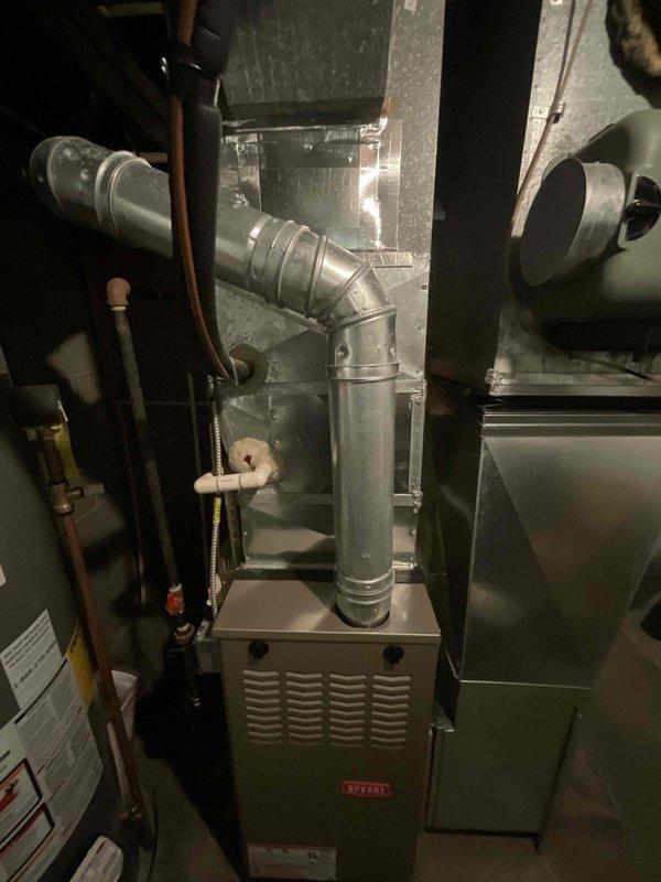 Conducted site evaluation for air conditioning system replacement estimate at residential property with basement-located HVAC equipment. Current AC unit is non-operational due to concerns about mold and mildew contamination following recent moisture remediation work, including newly installed basement pump system. Assessed existing furnace installation, ductwork configuration, and mechanical room conditions to determine appropriate replacement equipment specifications and integration requirements with current heating system infrastructure.