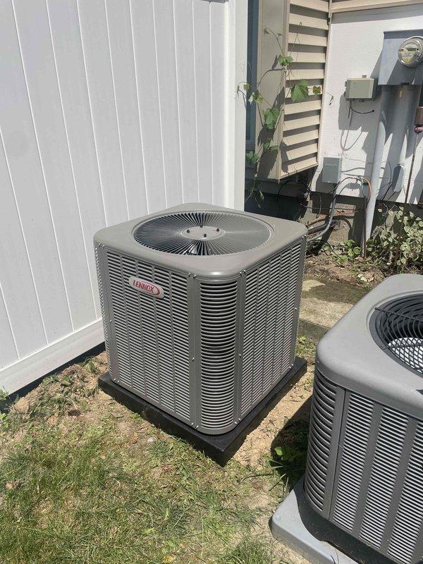 Completed full HVAC system installation including a Lennox 70,000 BTU furnace in basement mechanical room and Lennox 2.5-ton air conditioning condenser unit in rear yard. Installed furnace with proper ductwork connections, sheet metal plenum with sealed seams, and flexible supply ductwork routed upward from unit. Positioned outdoor condenser on pad with proper clearances, completed refrigerant line connections, electrical hookups, and condensate drainage. All equipment tested and operational upon completion.