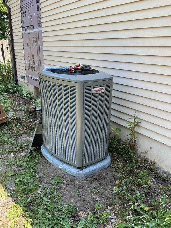 Completed full HVAC system installation including a 90,000 BTU furnace with integrated humidifier and 3-ton Lennox air conditioning condenser unit. Installed furnace in basement mechanical room with proper ductwork connections and mounted humidifier to supply plenum. Positioned AC condenser on exterior concrete pad against house foundation with refrigerant lines reconnected to indoor coil. Permit was obtained for mechanical-only work prior to installation. All equipment installed per manufacturer specifications with proper electrical connections, condensate drainage, and airflow configuration. System tested and operational upon completion. Submitted required financing documentation through electronic signature platform for processing.