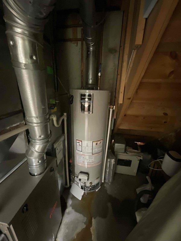 Responded to service call for non-operational air conditioning system. Upon inspection, confirmed complete system failure of 25-year-old AC unit that had exceeded its expected service life. Evaluated existing Trane HVAC equipment located in basement utility closet, including air handler, ductwork configuration, and associated components. Documented current installation setup with air handler positioned adjacent to water heater in confined mechanical space, noting vertical ductwork runs and existing electrical conduit routing. Prepared comprehensive estimate for complete AC system replacement to restore cooling functionality. Recommended full system replacement due to age and obsolescence of existing equipment, emphasizing priority timeline to meet immediate cooling needs.