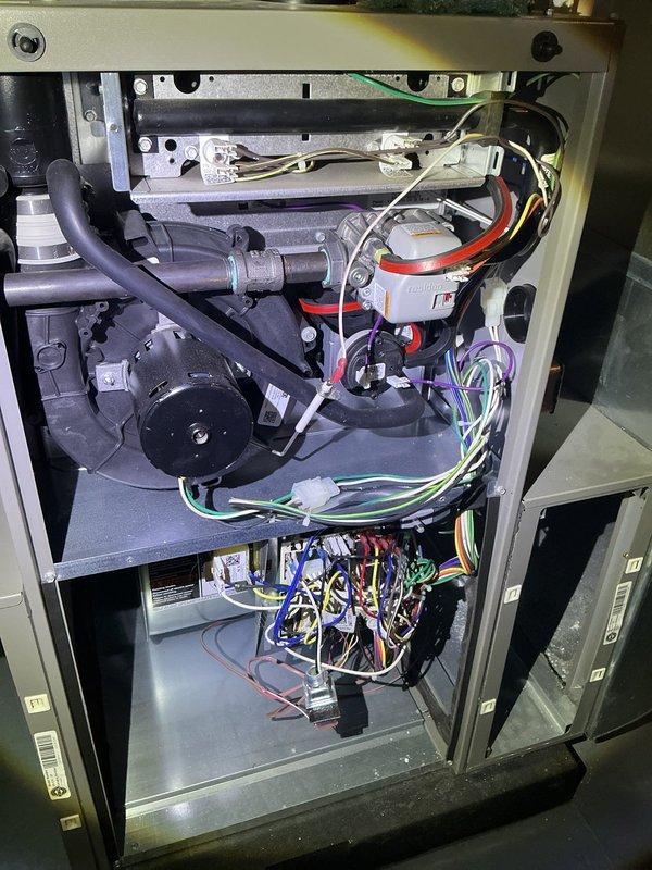 Completed comprehensive ComfortGuard maintenance package on 4-year-old furnace and air conditioning system. Performed full system inspection of both heating and cooling units, including blower motor examination, electrical connections verification, and control module assessment. Replaced two furnace filters as requested and confirmed air conditioning system operational status after extended period of inactivity.
