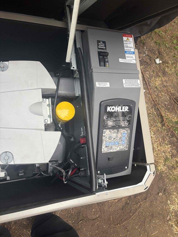 Completed full installation of Kohler 20kW standby generator system on prepared concrete pad adjacent to building exterior. Installed generator unit with weather-protective enclosure, established electrical connections including circuit breaker panel integration, and routed conduit with proper mounting hardware and wall brackets to building structure. Secured all refrigerant lines, electrical conduit, and fuel connections per manufacturer specifications, verified proper grounding, and conducted operational testing to ensure system functionality.