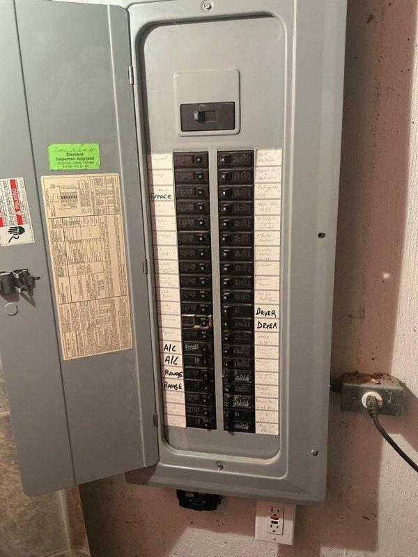 Responded to service callback for tripping breaker affecting 6-year-old A/C unit located in basement. Inspected main electrical panel and circuit breaker configuration, verified proper breaker sizing and connections for A/C circuit, and documented panel condition with circuit directory labeling. Resolved breaker tripping issue to restore cooling system operation.