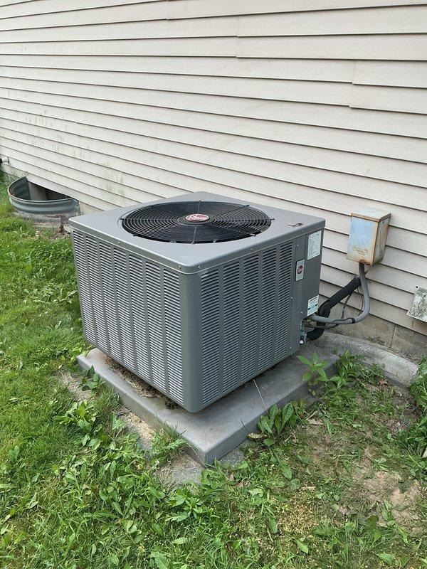 Responded to no cooling call on residential Rheem air conditioning system. Upon arrival, customer reported unit was now operating properly. Converted service call from repair to preventative maintenance tune-up. Performed complete system inspection of outdoor condenser unit, verified proper operation of compressor and condenser fan motor, checked electrical connections at disconnect box, and confirmed adequate airflow through condenser coil. Unit found in good operating condition with no immediate repairs required.