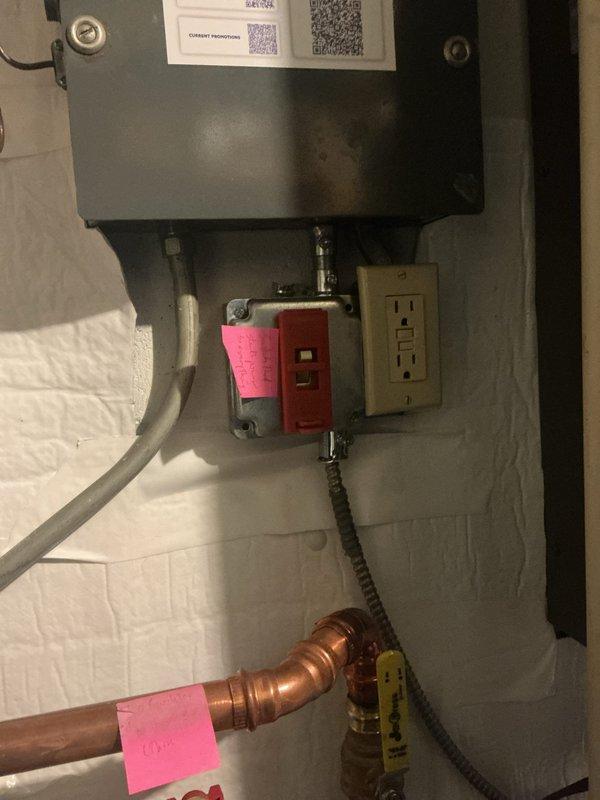 Conducted comprehensive site assessment for electrical panel upgrade in residential utility area. Documented existing electrical infrastructure including main panel, junction boxes with GFCI protection, and conduit routing. Photographed current panel configuration, associated electrical components, and surrounding plumbing systems to ensure proper clearance requirements for upgrade work. Verified accessibility to panel location and water meter for accurate estimate preparation.