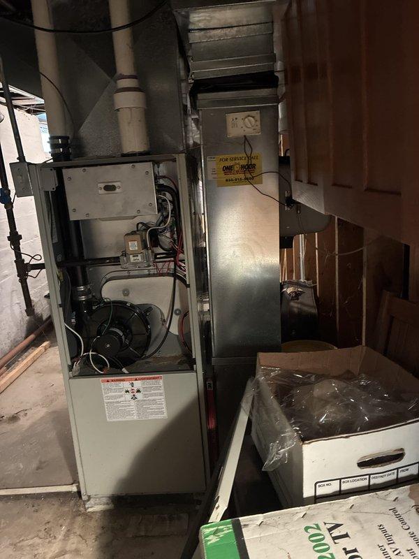 Completed estimate for replacement of 20+ year old natural gas furnace and new air conditioning system installation in basement location. Current furnace is operational but aged beyond recommended service life. Evaluated existing ductwork system, including flexible and rigid metal ducting, electrical connections, and venting configuration to determine specifications for replacement equipment and new AC system integration.