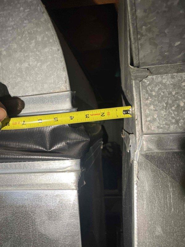 Conducted on-site evaluation of non-functioning air conditioning system located in basement area. Performed measurements of existing ductwork and clearances to assess equipment replacement requirements. Documented current HVAC installation conditions including duct dimensions and spatial constraints for proper sizing of new equipment. Provided comprehensive replacement estimate for failed AC unit.