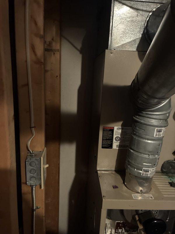 Conducted comprehensive assessment of 16-year-old HVAC system with depleted refrigerant levels in air conditioning unit. Evaluated existing furnace and AC equipment in basement utility area, documented current system configuration including ductwork and electrical connections, and provided full system replacement estimate for both heating and cooling components due to age and refrigerant loss in existing unit.