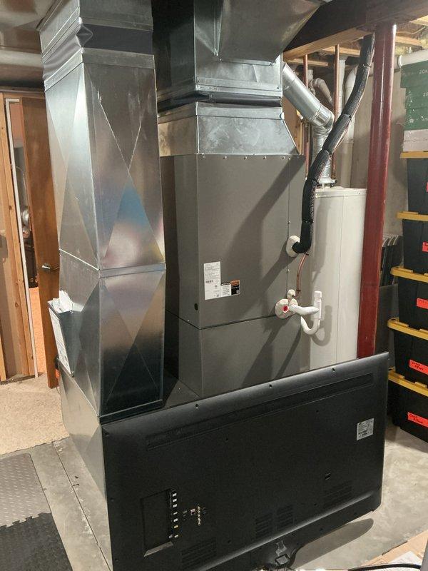 Completed routine maintenance on residential air conditioning system. Inspected evaporator coil, refrigerant lines, condensate drain system, and all accessible components. System operating within normal parameters with no issues identified.