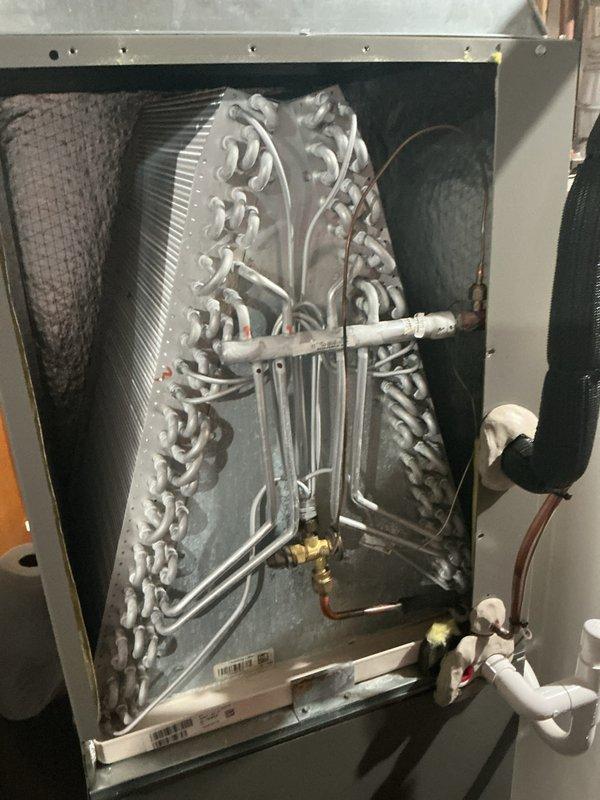 Completed routine maintenance on residential air conditioning system. Inspected evaporator coil, refrigerant lines, condensate drain system, and all accessible components. System operating within normal parameters with no issues identified.