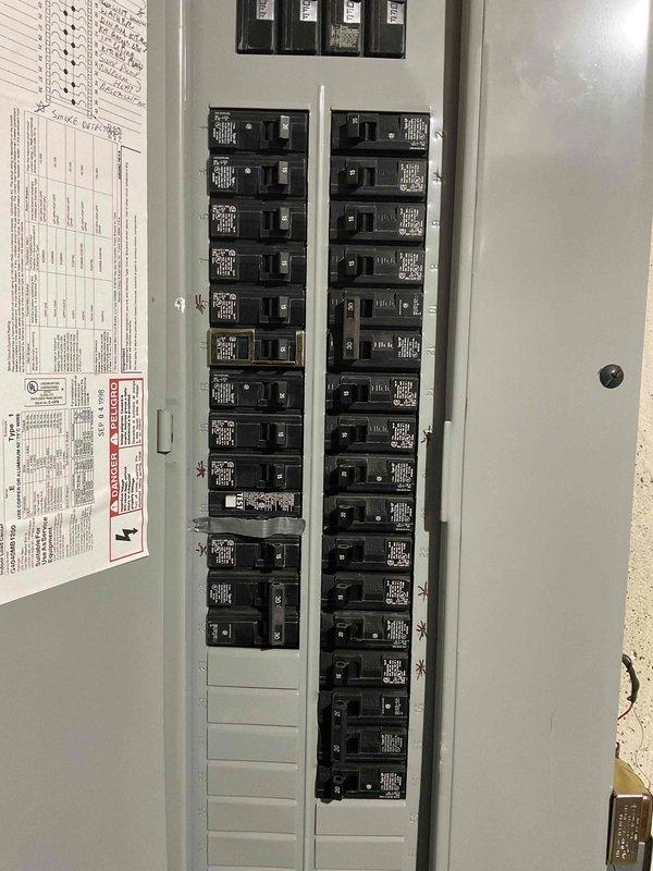 Completed electrical estimate for Generac generator installation with ComfortGuard Maintenance Package. Evaluated existing electrical panel infrastructure and circuit breaker configuration to determine compatibility and capacity requirements for generator integration. Documented current electrical system setup including main breaker panel with dual columns of circuit breakers and verified electrical wiring approval compliance for proposed generator connection.