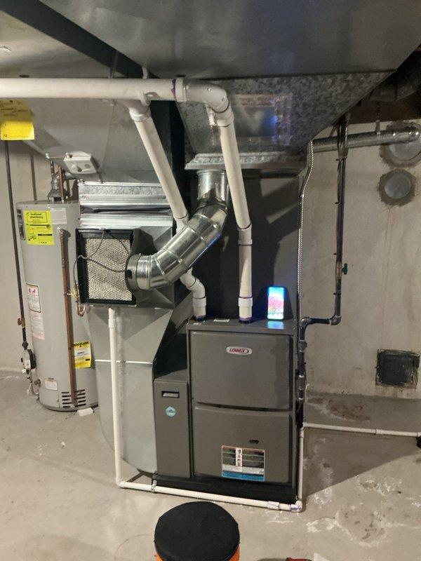 Completed comprehensive AC tune-up and preventive maintenance on a five-year-old Lennox central air conditioning system with matching furnace. Performed standard maintenance protocol including inspection of all electrical connections, refrigerant levels, condensate drain system, blower motor assembly, and ductwork integrity. System found to be operating within manufacturer specifications with no deficiencies noted; all components functioning properly and unit ready for continued service.